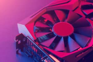 Video graphics card. Abstract bright pink blue light. Gpu background. Source: shutterstock.com