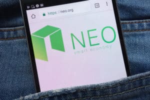 KONSKIE, POLAND - JUNE 01, 2018: NEO cryptocurrency website displayed on smartphone hidden in jeans pocket.