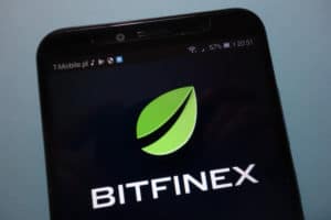 KONSKIE, POLAND - SEPTEMBER 15, 2018 Bitfinex cryptocurrency trading platform logo on smartphone. Source; shutterstock.com