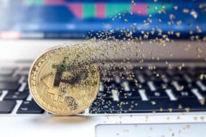 Bitcoin fail concept, Physical golden bitcoin bursting disperse in pieces fragments