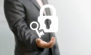 Businessman offers his hand in icon lock with key. Data Security Business Internet Concept. Secure information, files computer, finance, web, network. Access. Open, unlock lock.