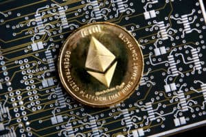 Ethereum ETH gold coin representing cryptocurrencies, against a computer circuit background.