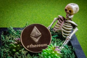 Ethereum coin in a graveyard and a skeleton.