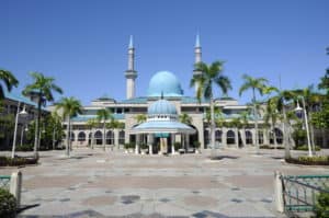 KUALA LUMPUR, MALAYSIA - JANUARY 15, 2015 The Sultan Haji Ahmad Shah Mosque or UIA Mosque in the International Islamic University Malaysia and surrounded by greenery and flora.
