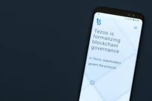 KYRENIA, CYPRUS -SEPTEMBER 12, 2018 Tezos website displayed on the smartphone screen. Tezos is a blockchain project that aims to offer the world’s first self-amending cryptocurrency
