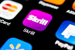 Sankt-Petersburg, September 30, 2018 Skrill application icon on Apple iPhone X smartphone screen close-up. Skrill app icon. Skrill is an online electronic finance payment system.