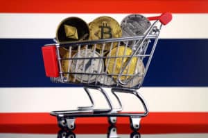 Shopping Trolley full of physical version of Cryptocurrencies (Bitcoin, Litecoin, Dash, Ethereum) and Thailand Flag.