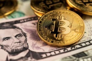 US Dollar and Bitcoin Cryptocurrency coins. BTC Dollar Bitcoin Cryptocurrency - Image